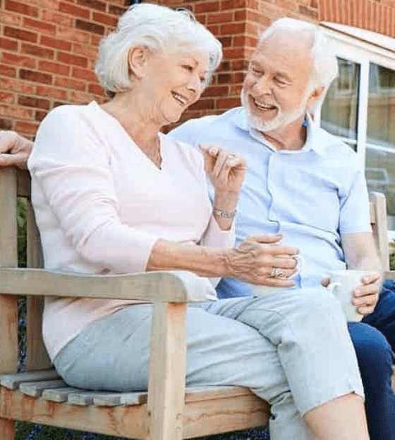 Dayspring Villa Assisted Living Community in Denver, CO - bigstock retired couple sitting on benc 258166153 min e1598360273479.jpg