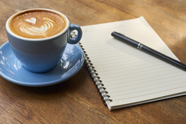 Dayspring Villa Assisted Living Community in Denver, CO - dayspring villa coffee with notebook and pen