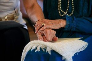 Dayspring Villa Assisted Living Community in Denver, CO - senior holding hands 768x512