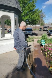 Dayspring Villa Assisted Living Community in Denver, CO - dayspring villa resident tends to community gardens