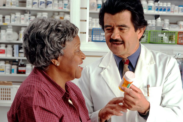 Dayspring Villa Assisted Living Community in Denver, CO - dsv pharmacist with senior woman Dayspring Villa Assisted Living Community in Denver, CO - dsv pharmacist with senior woman