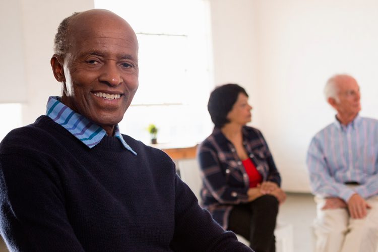 Dayspring Villa Assisted Living Community in Denver, CO - man in support groupjpg