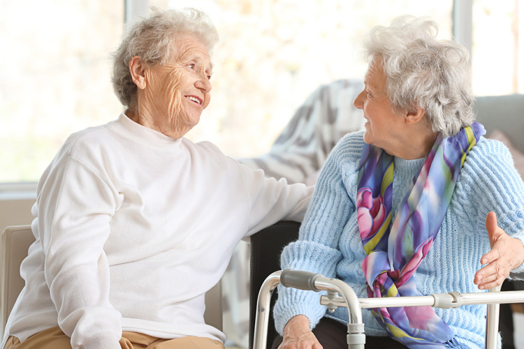 Dayspring Villa Assisted Living Community in Denver, CO - dayspring villa two senior woman conversing (1)