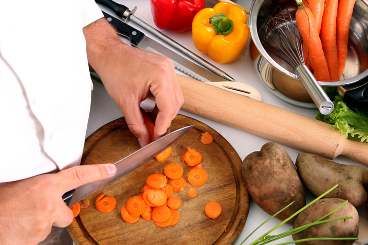 Dayspring Villa Assisted Living Community in Denver, CO - dayspring villa overhead view of chef preparing vegetables Dayspring Villa Assisted Living Community in Denver, CO - dayspring villa overhead view of chef preparing vegetables