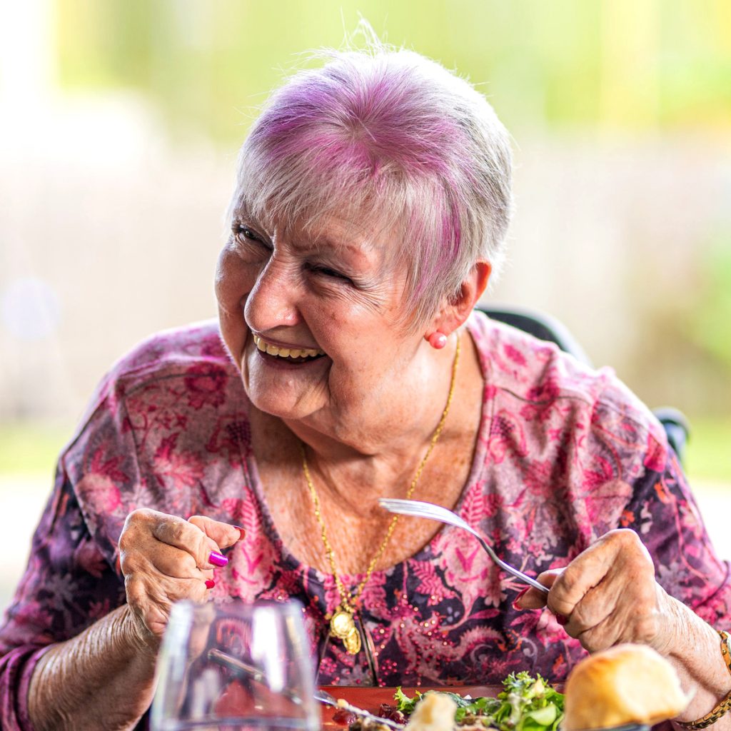 Dayspring Villa Assisted Living Community in Denver, CO - dayspring villa happy senior woman eating (1)